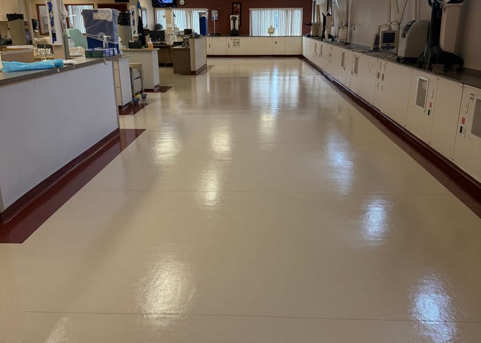 Commercial floor after professional waxing and polishing